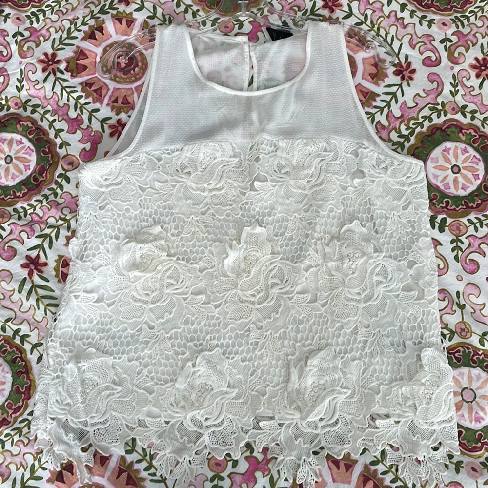 Anthropology Lacy lined sleeveless top. Soft Ivory Color. Size Large